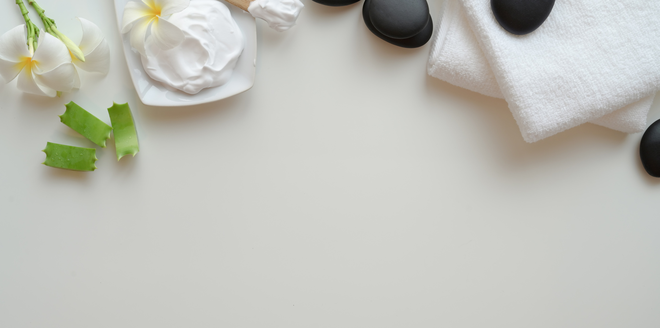 Skin care products on white table
